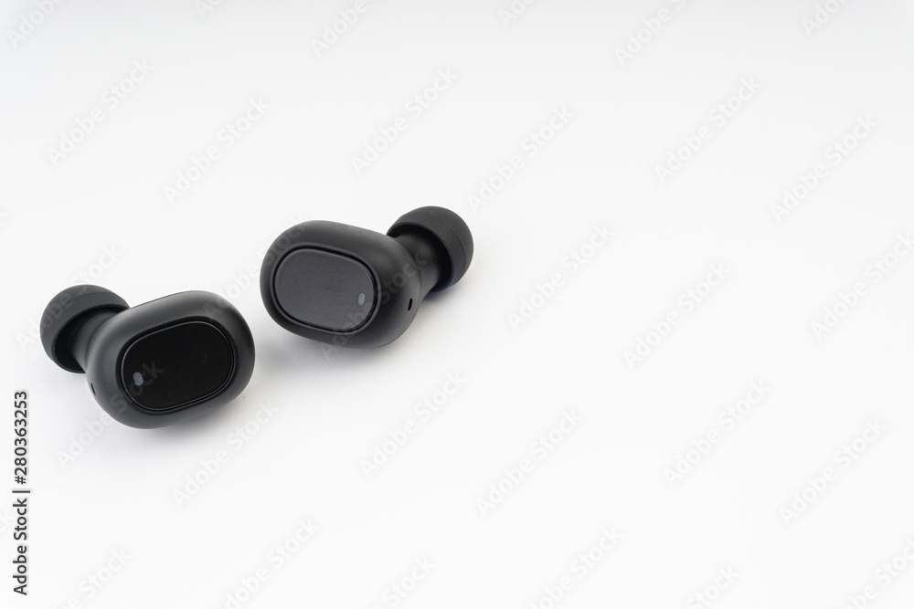 Wireless earbuds or earphones on white background Wireless earbuds or earphones on white background