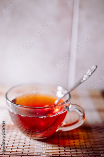 tea in a clear glass black