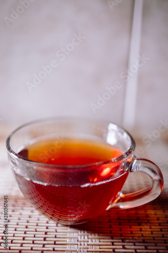 tea in a clear glass black