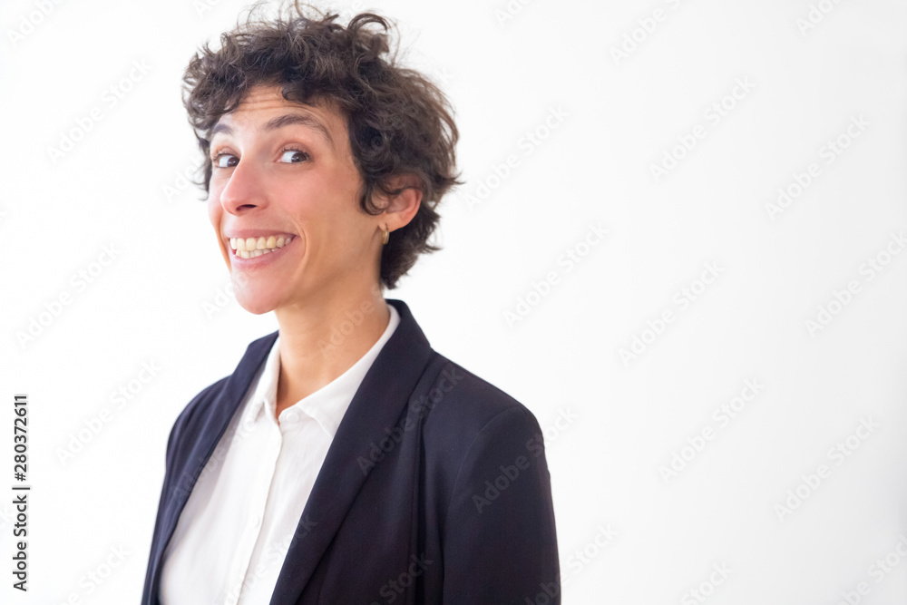 Happy businesswoman looking at camera. Portrait of cheerful middle aged woman in formal wear smiling at camera isolated on white background. Emotion concept Happy businesswoman looking at camera. Portrait of cheerful middle aged woman in formal wear smiling at camera isolated on white background. Emotion concept