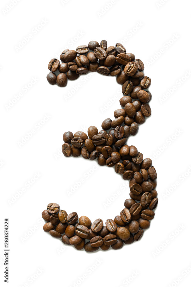 A digit 3 laid out of roasted fragrant coffee beans on a white background A digit 3 laid out of roasted fragrant coffee beans on a white background