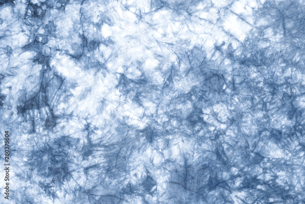 tie dye pattern hand dyed on cotton fabric abstract background. tie dye pattern hand dyed on cotton fabric abstract background.