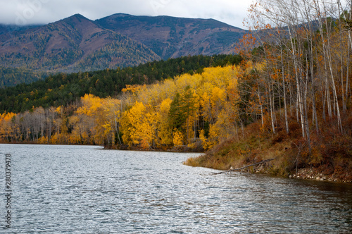 Lake Baikal Russia, autumn colors along shoreline of Chivyrkuysky Bay photo