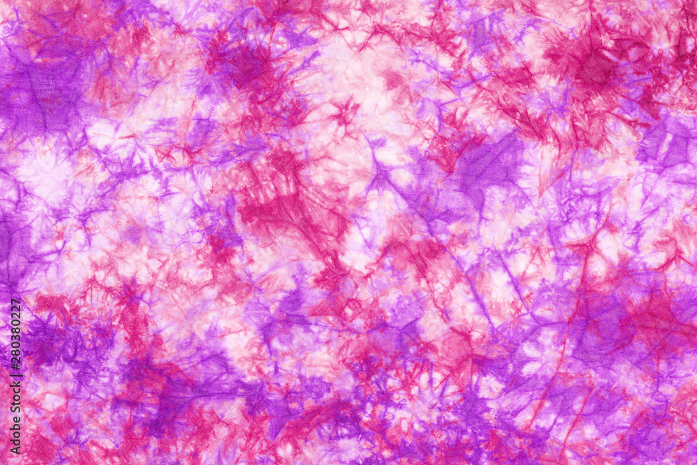 tie dye pattern hand dyed on cotton fabric abstract background. tie dye pattern hand dyed on cotton fabric abstract background.