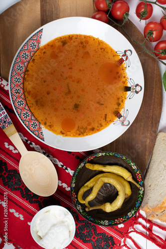 Top view of plate with meatballs soup, traditional plate of the Romanian cuisine, ciorba de perisoare photo