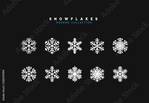 Set vector snowflakes. Collection of snowflake winter decoration. Isolated on black background photo