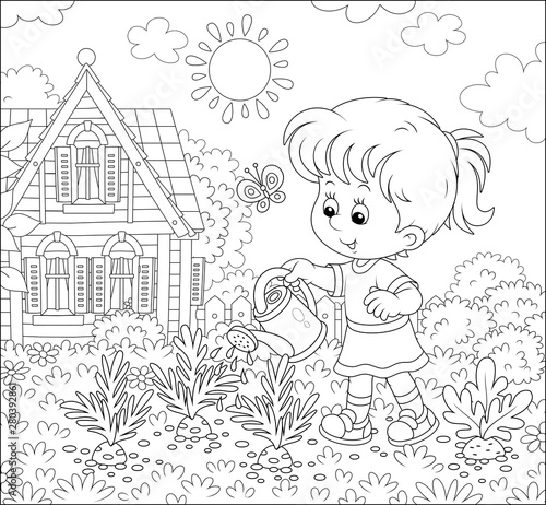 Smiling little girl waterin...