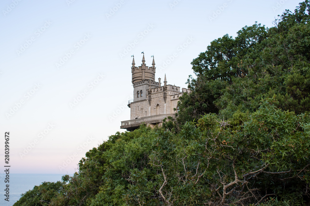 Castle Swallow Nest on a rock in the Black Sea. Yalta, Crimea, Russia. . Beautiful view of the Swallow Nest on a cliff in summer Castle Swallow Nest on a rock in the Black Sea. Yalta, Crimea, Russia. . Beautiful view of the Swallow Nest on a cliff in summer