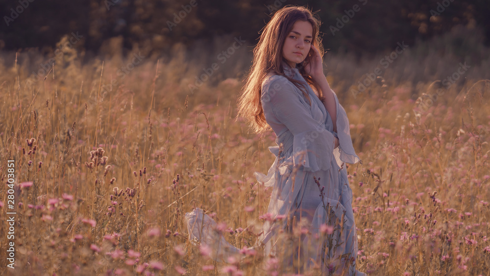 Portrait of a girl on the background of summer nature Portrait of a girl on the background of summer nature