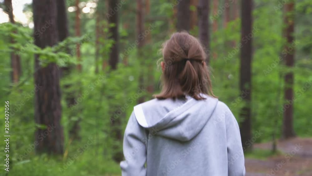 Little girl running in the forest. Sports concept. Little girl running in the forest. Sports concept.