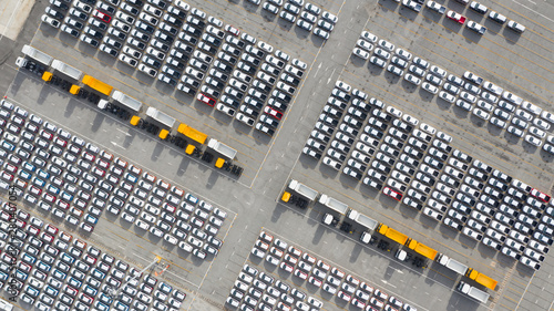 Aerial view new cars export terminal, New cars waiting for import export at deep sea port.