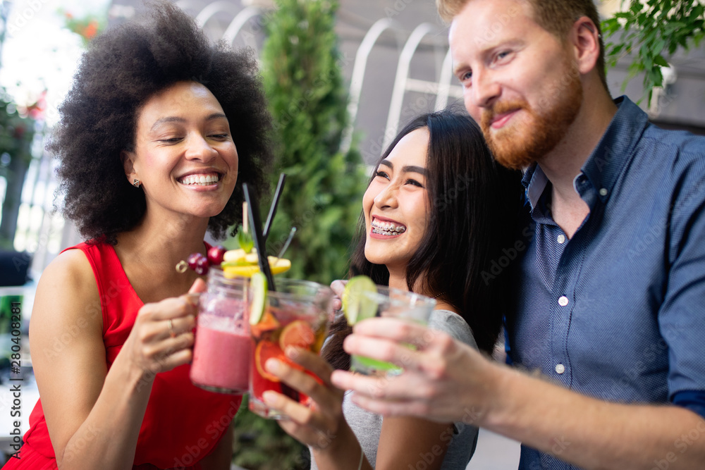 Group of friends having fun together. People talking laughing and enjoying their time Group of friends having fun together. People talking laughing and enjoying their time