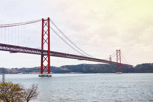 The 25 April bridge (Ponte 25 de Abril) is a steel suspension bridge located in Lisbon, Portugal, crossing the Targus river. It is one of the most famous landmarks of the region. © bondvit