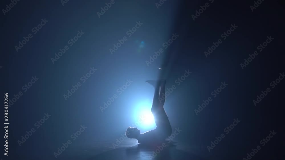 Freestyler making tricks with ball upside down. Slow motion Freestyler making tricks with ball upside down. Slow motion