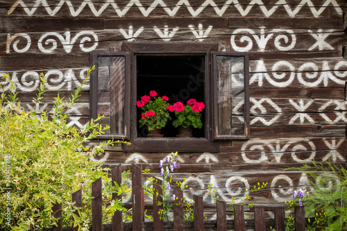 Obraz na płótnie Old wooden houses in Slovakia UNESCO village Cicmany. The ornaments from Cicmany, and the Slovak folk pattern. w salonie