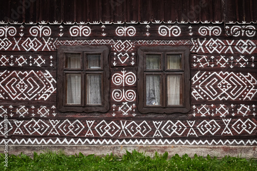 Obraz na płótnie Old wooden houses in Slovakia UNESCO village Cicmany. The ornaments from Cicmany, and the Slovak folk pattern. w salonie