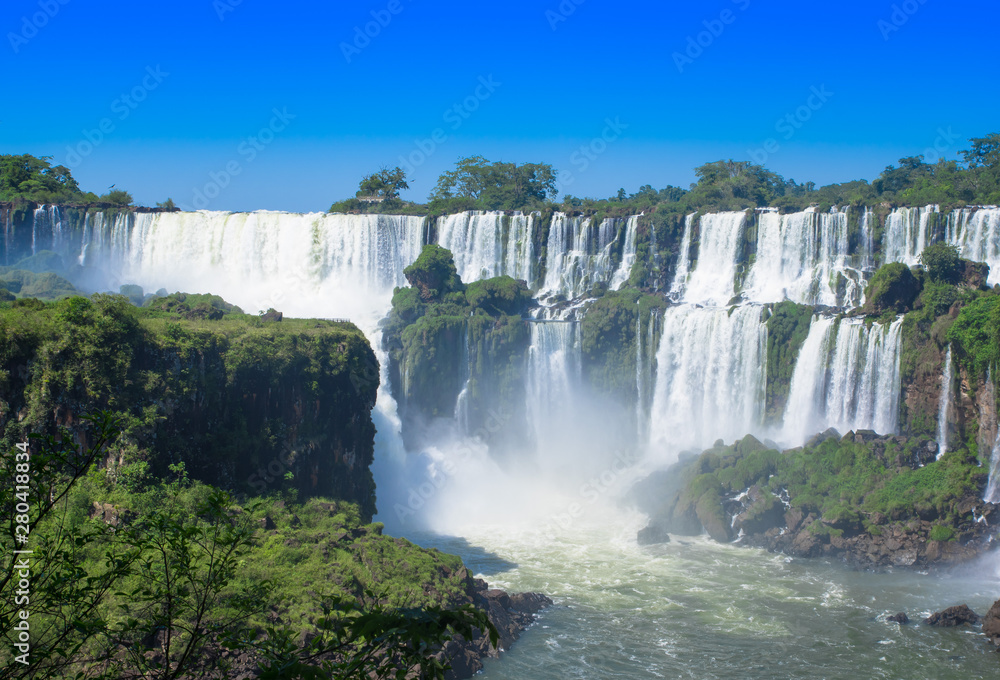 Naklejka premium Aerial view of Iguazu Falls from the helicopter ride, one of the Seven Natural Wonders of the World , Brazil