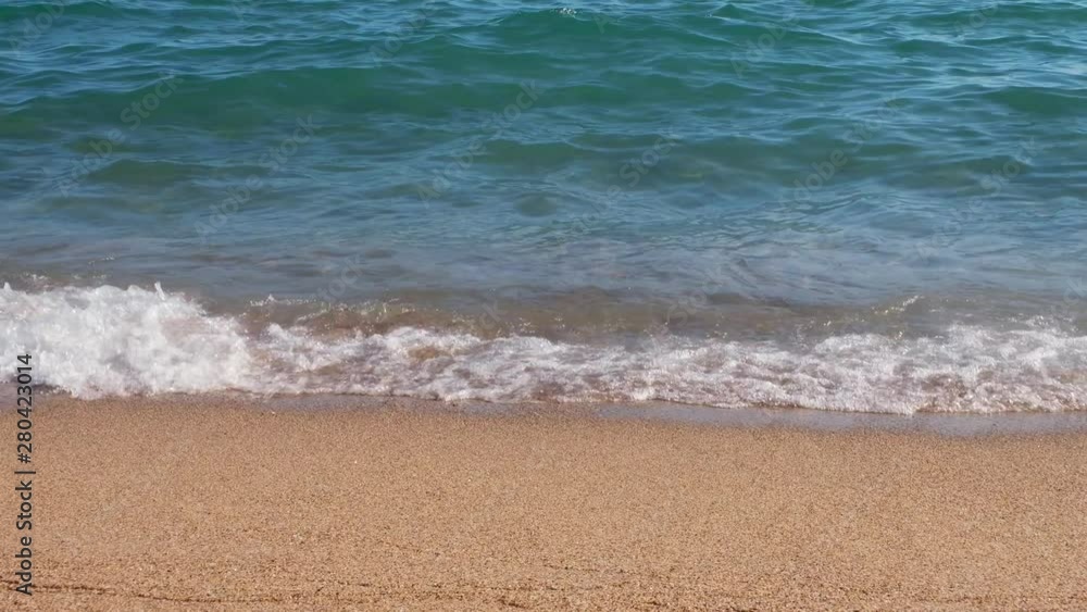 Sea shore and waves at sunset in Cannes, France Sea shore and waves at sunset in Cannes, France
