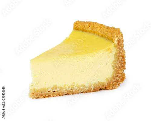 Piece of lemon cheesecake isolated on white