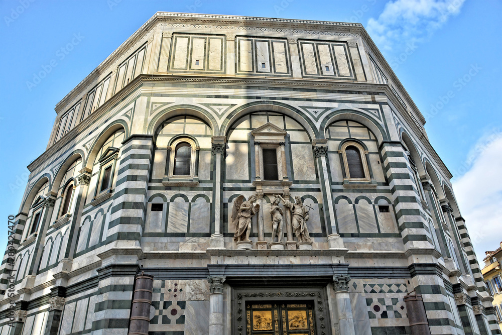 The Baptistery is one of the oldest buildings in Florence Italy. 4th century. Iconic octagonal basilica with striking marble facade, known for its bronze doors and mosaic ceiling. Italy, Florence