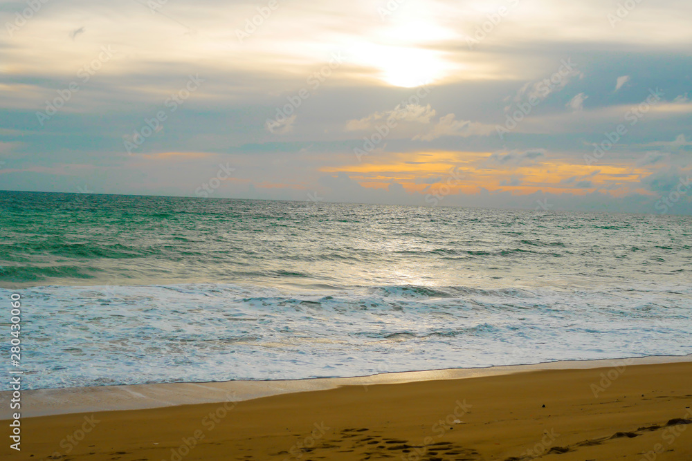 Beautiful beach ocean wave with blue color water of the sea background in daytime