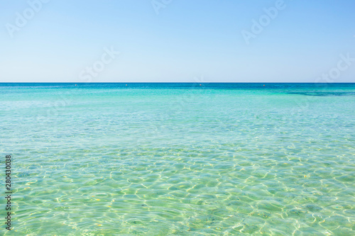 Beautiful sea with turquoise water and golden beach in Salento.