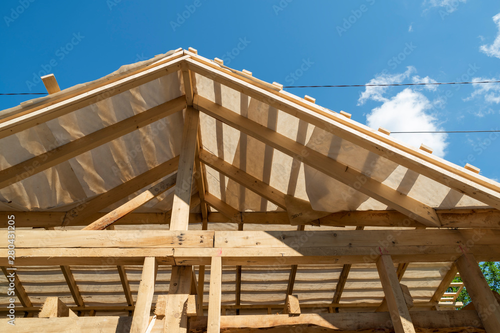 gable roof frame of wooden rafters and beams gable roof frame of wooden rafters and beams