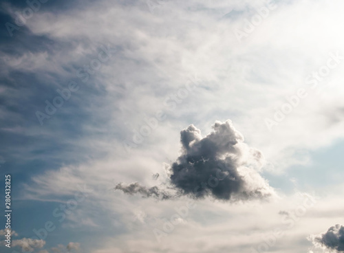 Obraz na plátně Natural looking afternoon sky with beautiful summer rain cumulus and stratus clo
