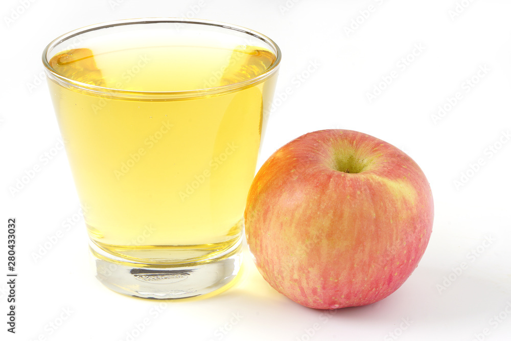 Red apple juice in glass and apple fruit isolated on white background Red apple juice in glass and apple fruit isolated on white background