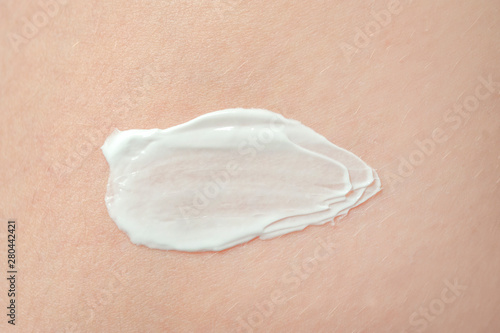 smear cream on body skin background