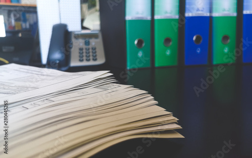 backlog table desk after returning in office from vacations photo