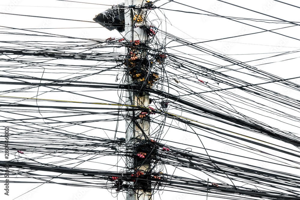 Messy chaos of cables with wires on electric pole on white background,The  many Electric wire on the power poles Stock Photo | Adobe Stock