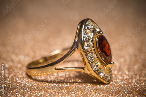 Golden ring with garnet
