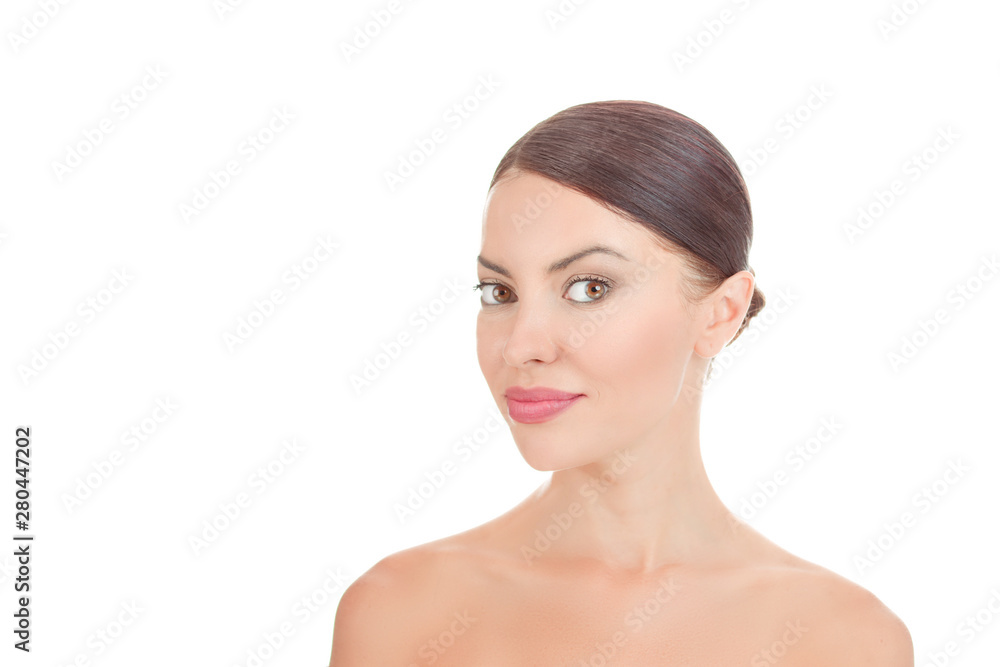 beautiful woman looking at you camera showing clean skin fresh face, with naked shoulders