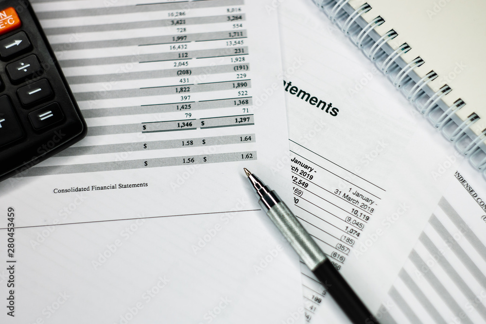Financial analysis - income balance statement, business plan with glass. Business composition of Investment portfolio. Financial analysis - income balance statement, business plan with glass. Business composition of Investment portfolio.