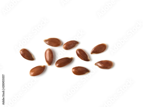 Extreme close up of flax seeds isolated on white background. Linseed pile closeup isolated on white with clipping path. Top view or flat lay. Macro shot