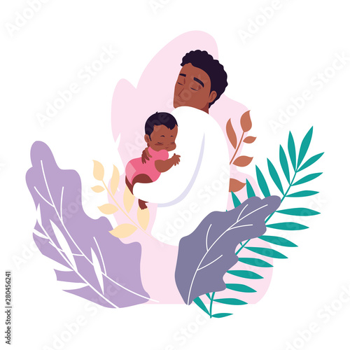 dad carrying his baby in his arms