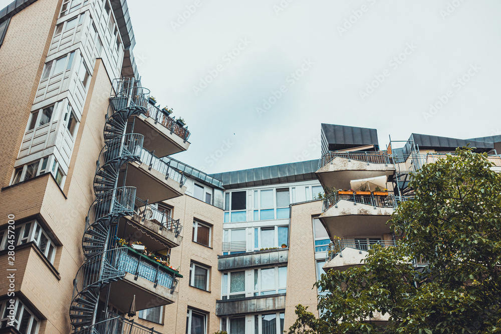 Fototapeta premium apartment building on a grey day at berlin, germany