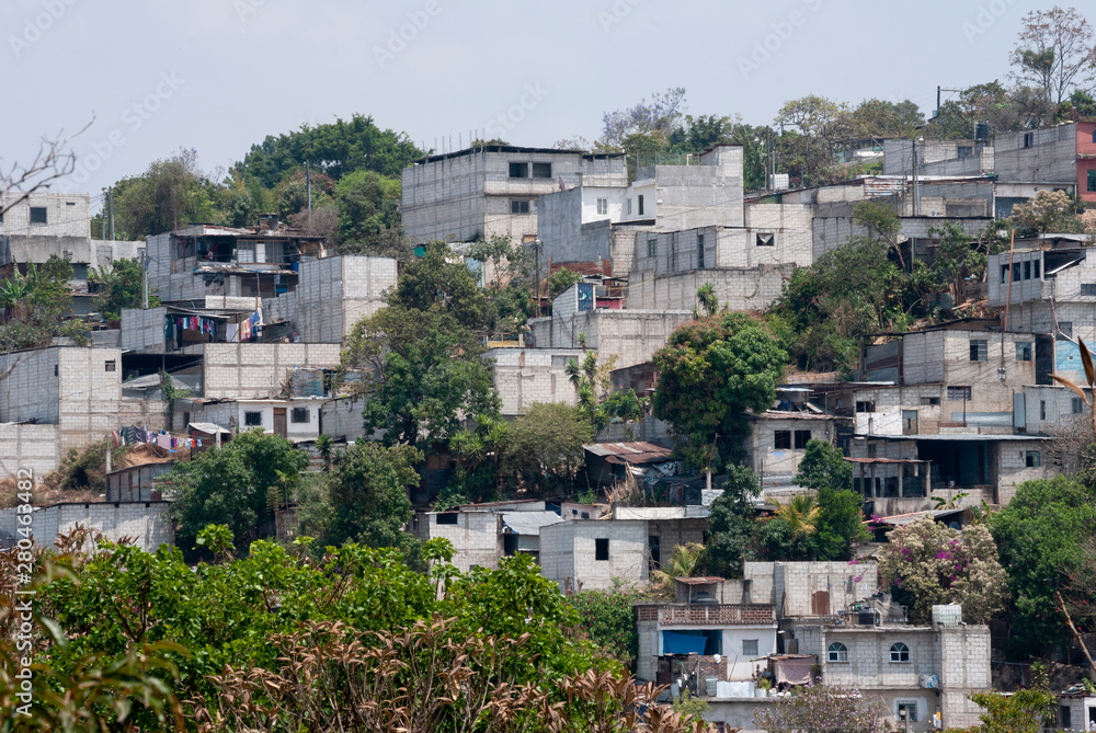 Guatemala City, favela type housing near downtown. Poor houses in Guatemala, showing poverty and lack of economic resources