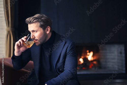 handsome man drink wine