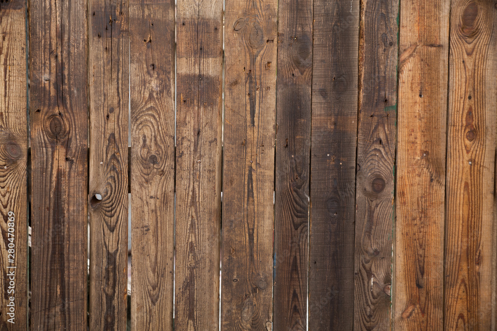 Textured brown old wooden plank background. Texture. Textured brown old wooden plank background. Texture.
