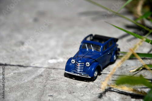 Moskvich 400-420 blue 1947 The legendary Soviet car scale 1/43. The collection model of a car of the USSR is a passenger Soviet car of the Moscow plant for the production of small cars (MZMA). Cabriol photo