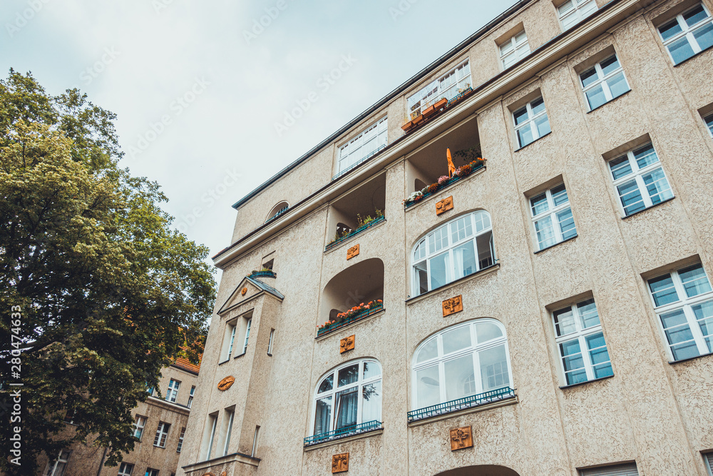 Naklejka premium apartment building on a grey day at berlin, germany