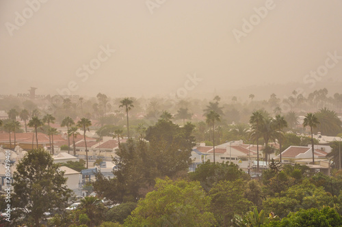 Severe sand storm from Africa known as Calima on Gran Canaria. Maspalomas district covered in dust photo