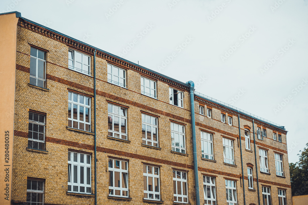 apartment building on a grey day at berlin, germany apartment building on a grey day at berlin, germany