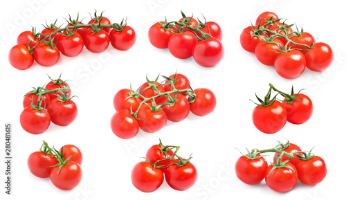 Branch of fresh cherry tomatoes isolated on white