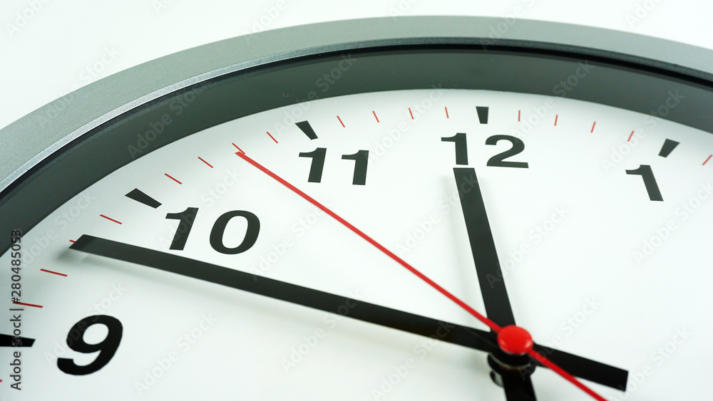 Close up Gray wall clock face beginning of time 14.45 on White background, Time concept.. Close up Gray wall clock face beginning of time 14.45 on White background, Time concept..