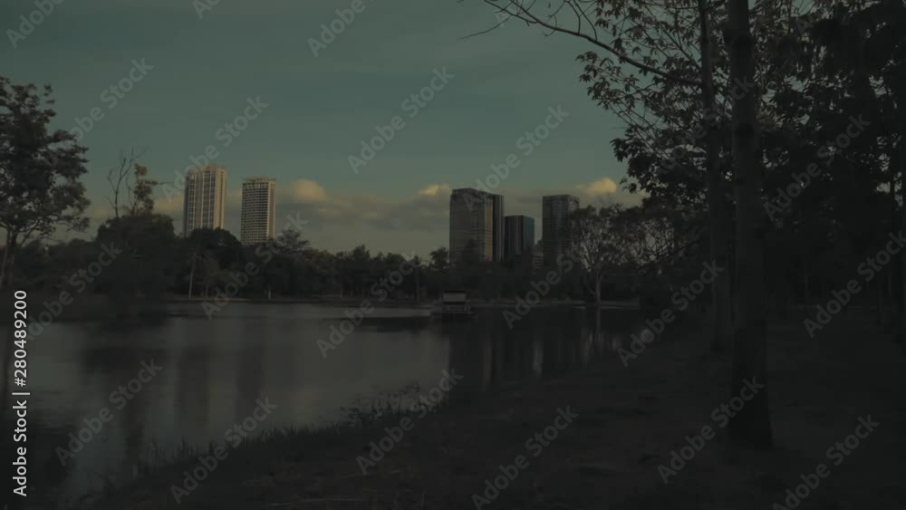 Looking at the building in a park. While time flies by. Looking at the building in a park. While time flies by.