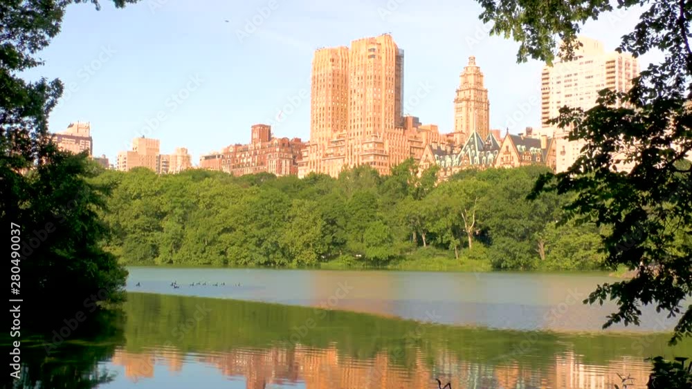 Central park, Manhattan, New York Lake view with cityscape Central park, Manhattan, New York Lake view with cityscape