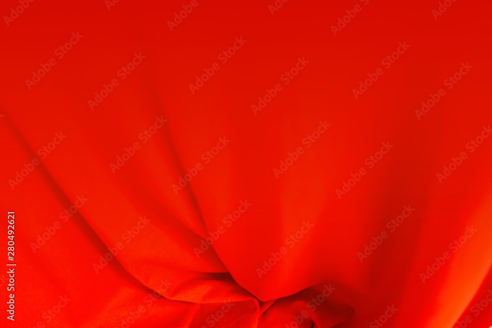 Red fabric material texture pattern on blur background Red fabric material texture pattern on blur background